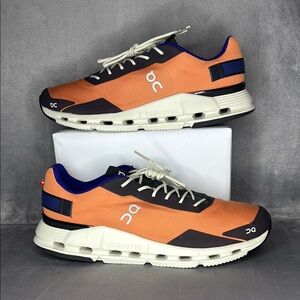 On Running Vibrant Orange and Black Sneakers